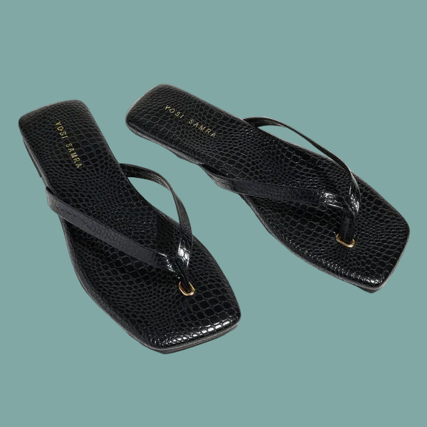 Black crocodile-patterned sandals with 'Yosi Samra' branding on a light gray background